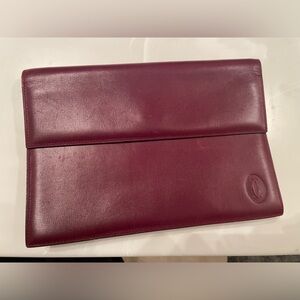 Lovely used Cartier clutch wristlet